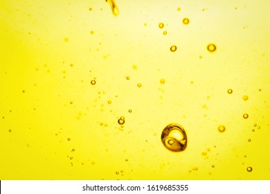 Cooking Oil With Bubbles As Background, Closeup