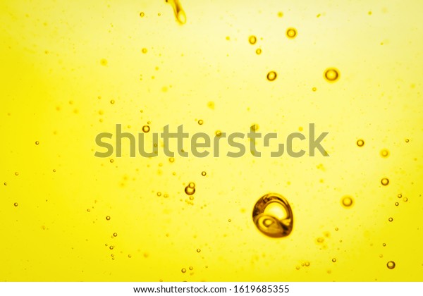 Cooking oil with\
bubbles as background,\
closeup