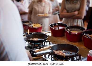 Cooking On Bar Food Buffet During Hotel Brunch, Catering, Food Bloggers Event, Banquet, Wedding, Festive Or Celebration Party, Chef Cooking Station Prepare For Guest