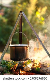 Cooking On A Campfire In A Cauldron On A Hike