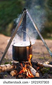 Cooking On A Campfire In A Cauldron On A Hike