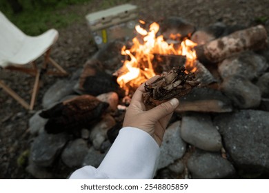 Cooking over a fire while camping