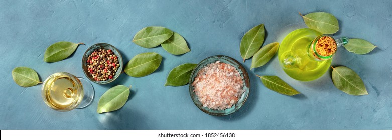 Cooking Panorama. A Flat Lay With Salt, Pepper, Bay Leaves, Olive Oil, And White Wine, Overhead Shot