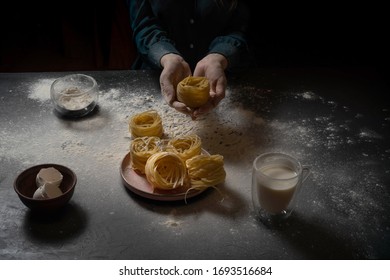 Cooking Pasta Spaghetti Pastry With Flour On A Dark Black Background With The Outer Space. Food Banner, Large Resolution.