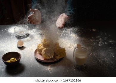 Cooking Pasta Spaghetti Pastry With Flour On A Dark Black Background With The Outer Space. Food Banner, Large Resolution.