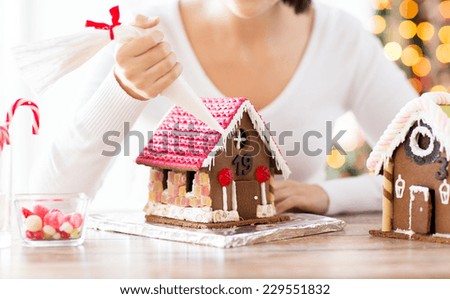 Similar – Image, Stock Photo Gingerbread girl cookie and little boy cookie. Christmas concept
