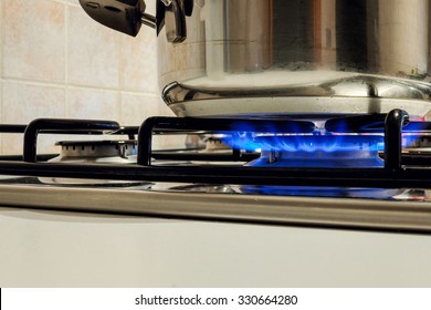 Cooking Plate: Cooktop - Gas Stovetop Burning In Light Background