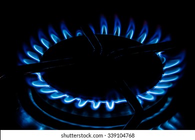 Cooking Plate: Cooktop - Gas Stovetop Burning In Dark Background