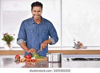 Cooking, portrait and happy man cutting vegetables on kitchen counter for healthy diet, nutrition or lunch. Chopping board, food and face of person preparing fresh salad for organic meal prep in home - Powered by Shutterstock