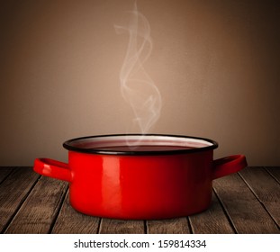 Cooking Pot On Old Wooden Table
