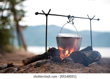 Cooking Pot Over The Fire