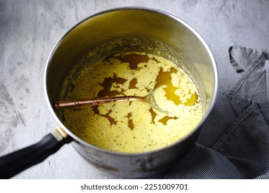 Cooking process of ghee | How to make clarified butter at home, selective focus