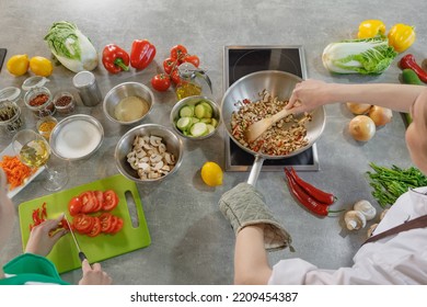Cooking in a rustic kitchen