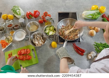 Cooking in a rustic kitchen