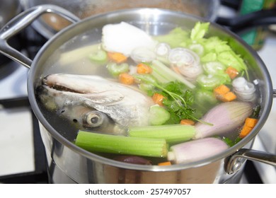 Cooking Salmon Fish Broth With A Vegetables 