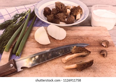 Cooking Of The Spring Morel Mushrooms With Sour Cream And Onion