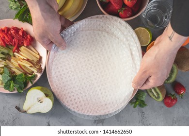 Cooking Spring Rolls Steps Process By Chef Hands With Rice Paper And Ingredients On Background. Asian Recipe Food Concept.