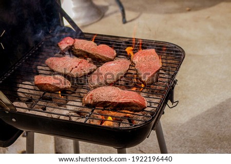 Cooking steaks on Fourth of July