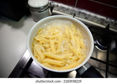 Cooking Tasty Pasta In Pot On Stove Indoors, Above View