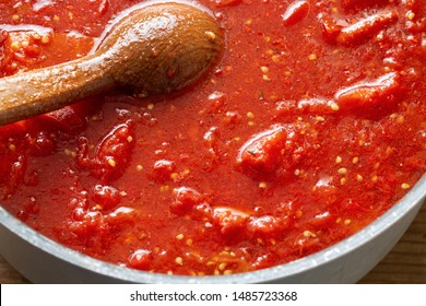 Cooking Tomato Sauce In A Large Pan