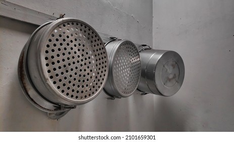 Cooking Utensils Hanging In A Home Kitchen