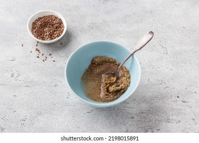 Cooking Vegan Flaxseed Egg On Gray Textured Background, Top View