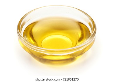 Cooking Vegetable Oil In A Small Glass Cup, Isolated On White Background