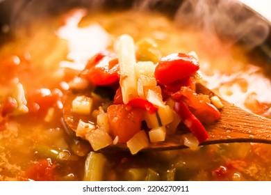 Cooking Vegetable Soup In Saucepan, Comfort Food And Homemade Meal Concept