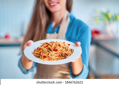 Cooking Woman Chef Holding A Pasta Plate 