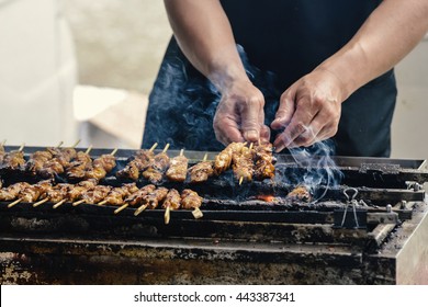 Cooking Yakitori on stall in Japan