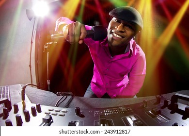 Cool African American Male DJ Playing Music At A Party