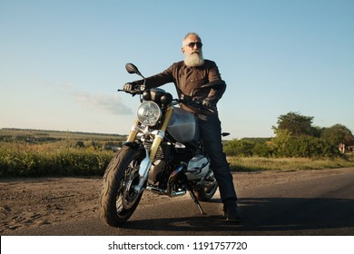 Cool Bearded Elder Man On Motorbike