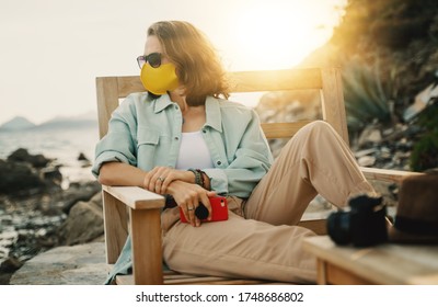 Cool Beautiful Girl Woman Traveler By The Sea With A Mask On Her Face, Stylish Outfit, Summer Travel 2020 Concept