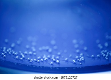 Cool blue underwater air bubbles background