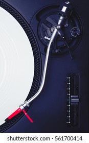 Cool Dj Turntable Record Player For Hip Hop Party.Overhead Vertical Shot Of Turn Table With Red Needle Cartridge On White Time Code Disc.Analog Audio Equipment For Disc Jockey To Play Music On Party