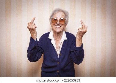 cool elder lady making middle finger sign