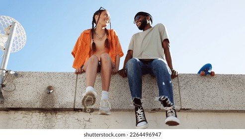 Cool, fashion and joke with young couple hang out on city building together bonding. Interracial stylish young people on a funny city date. Silly, goofy and laughing black man and woman joking - Shutterstock ID 2264496947