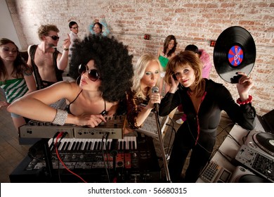 Cool Female DJs Performing At A 1970s Disco Music Party