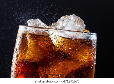 A Cool Glass Of Cola Drink With Ice, Bubbles And Fizz