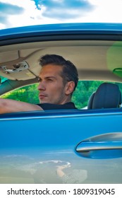 A Cool And Handsome Guy Driving A Car, Sunny Day