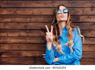 Cool hipster student woman wearing eyewear glasses . Caucasian female university student looking at camera smiling happy. - Shutterstock ID 407632294