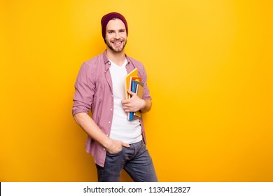 Cool lecture learn career assistant teen age youth people person model fashion concept. Portrait of confident self-assured handsome student carrying book in hands isolated on background copy-space - Shutterstock ID 1130412827