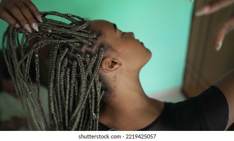 Cool Long Braided Hair. A Black Hispanic Latina Playing With Box Braided Hair