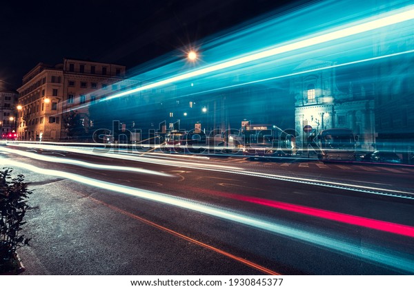 Cool long exposure cars traffic light trails,\
night view of the city of\
Rome\
