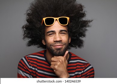 Cool Man With An Afro And Sunglasses Poses