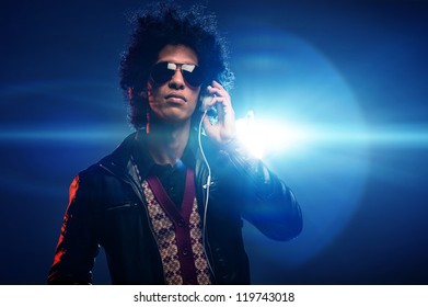 Cool Nightclub Party Dj Portrait With Headphones Lighting Flare And Sunglasses