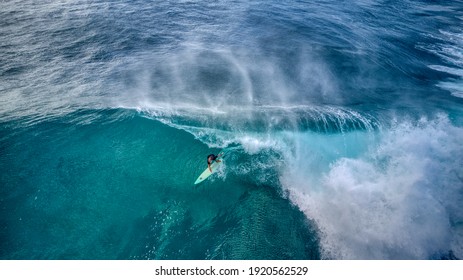 Cool Overhead View Of A Surfer Riding A Breaking Wave At Sunset Beach, Hawaii