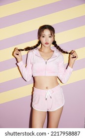 Cool portrait of a young Asian woman in sportswear