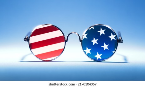 Cool red, white, and blue sunglasses in the pattern of the US American flag. For USA 4th of July or other patriotic celebrations. - Shutterstock ID 2170104369