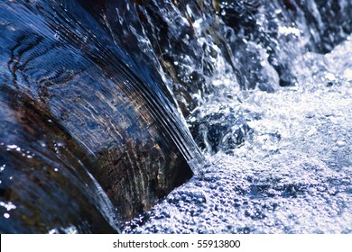 Cool Rushing Water In Natural Stream